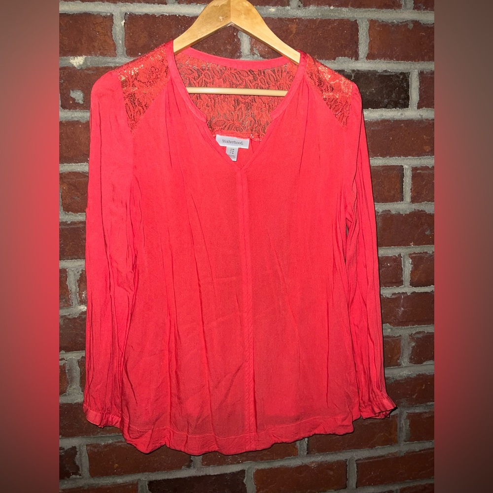 Motherhood Maternity blouse in coral with lace at the shoulders